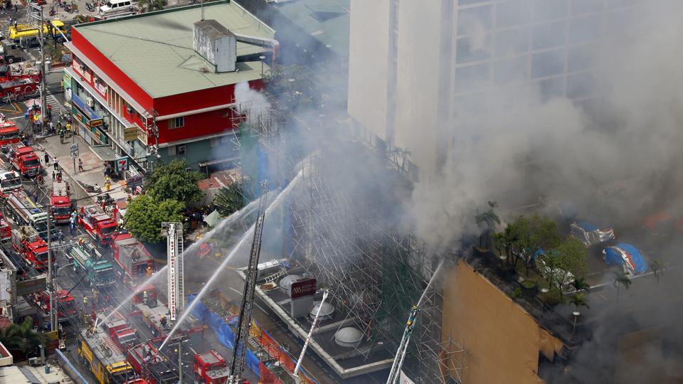 Four killed, 19 trapped in Philippine hotel fire World News