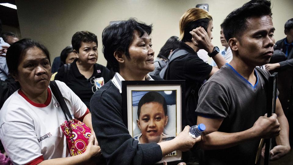 Photos: Philippines gripped by dengue vaccine scare after immunisation ...