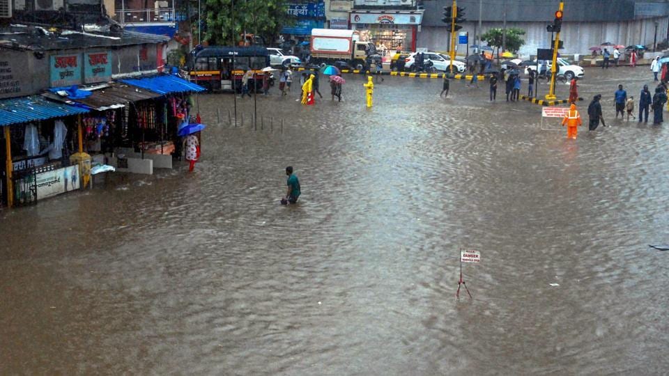 Mumbai rains highlights Monsoon brings city to halt; waterlogging