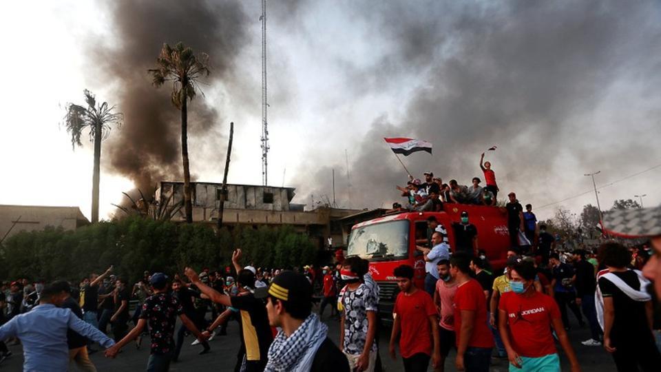 Basra airport targeted by rocket fire as violent protests grip Iraq ...