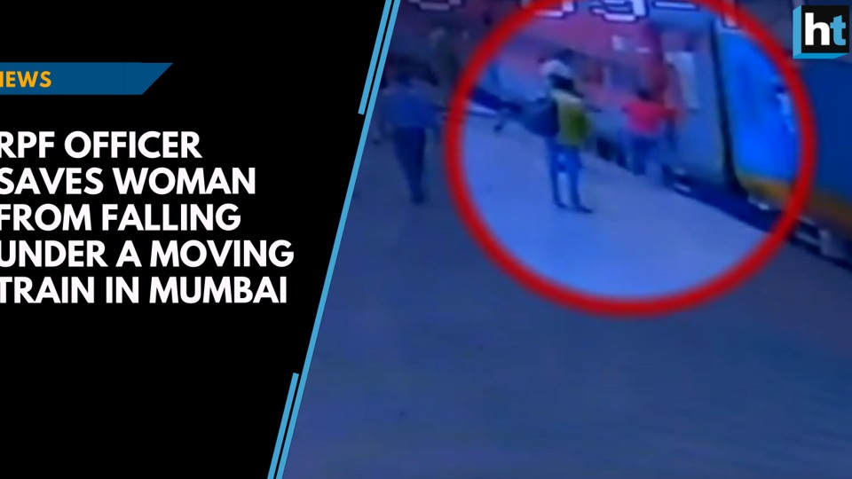 Watch: RPF officer saves woman from falling under a moving train in ...