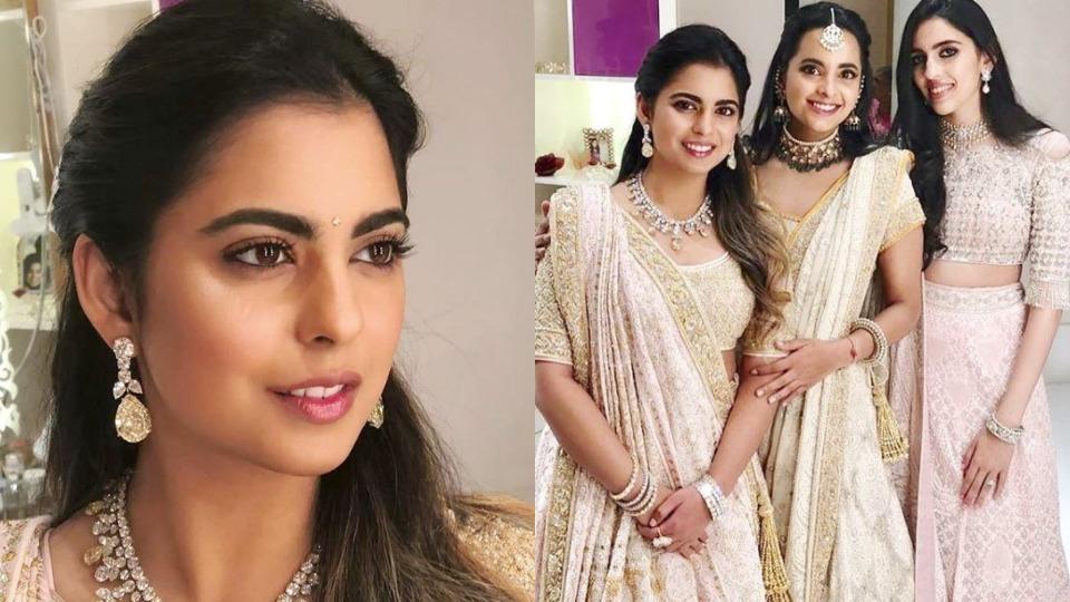 Isha Ambani looks enchanting in gorgeous gold and pink lehenga at ...