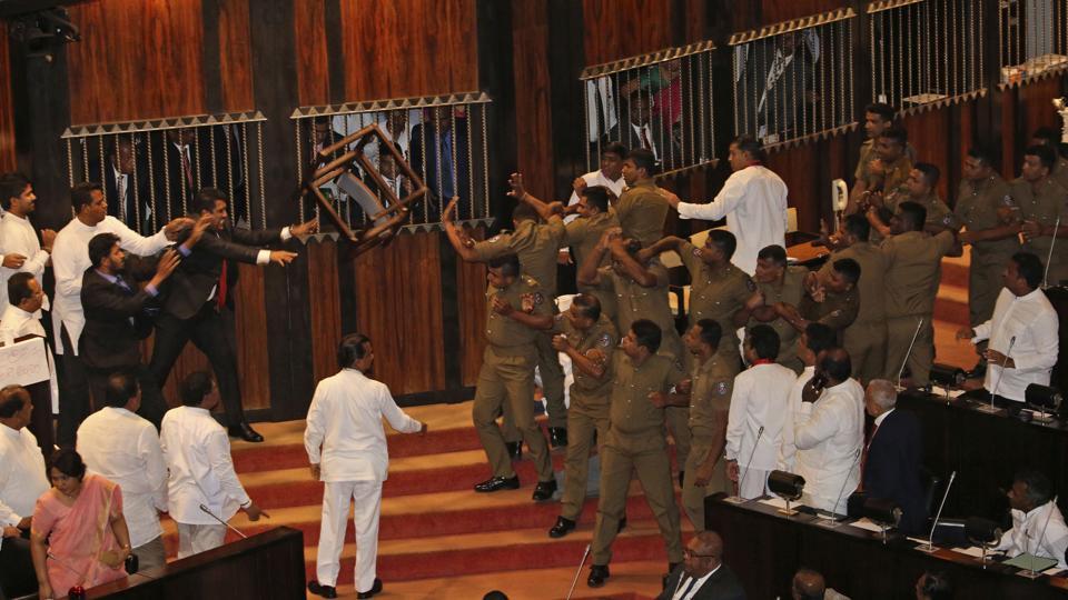 Sri Lanka MPs hurl chilli powder, chairs in Parliament commotion | World  News - Hindustan Times