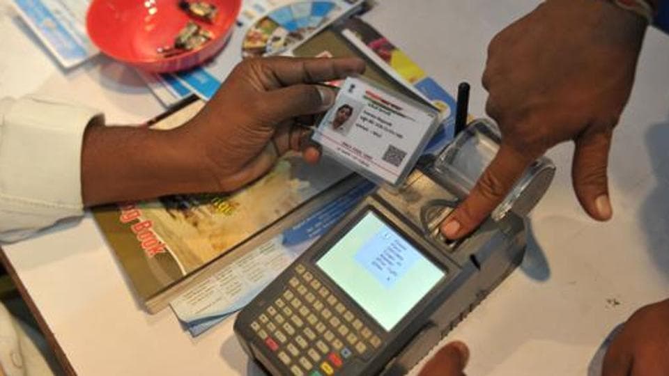 Cabinet okays legal changes to link Aadhaar with mobiles, bank accounts