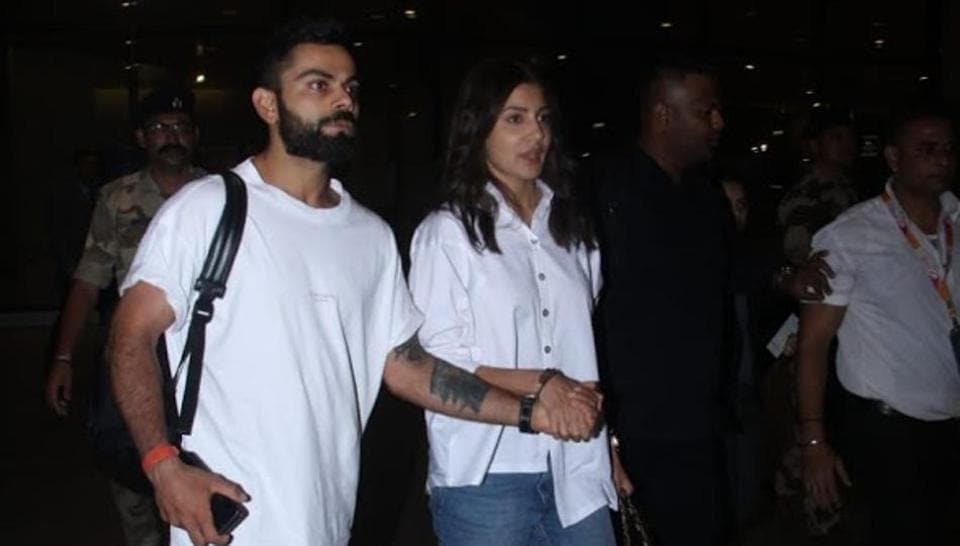 Anushka Sharma and Virat Kohli twin in black and white outfits