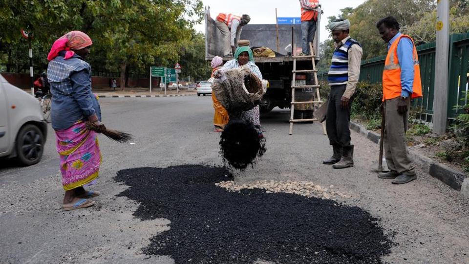 Potholes dot Chandigarh’s Madhya Marg