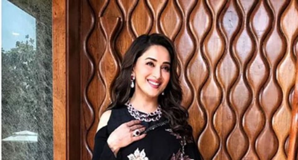 Madhuri Dixit’s stunning black saree is everything royal. See latest pics