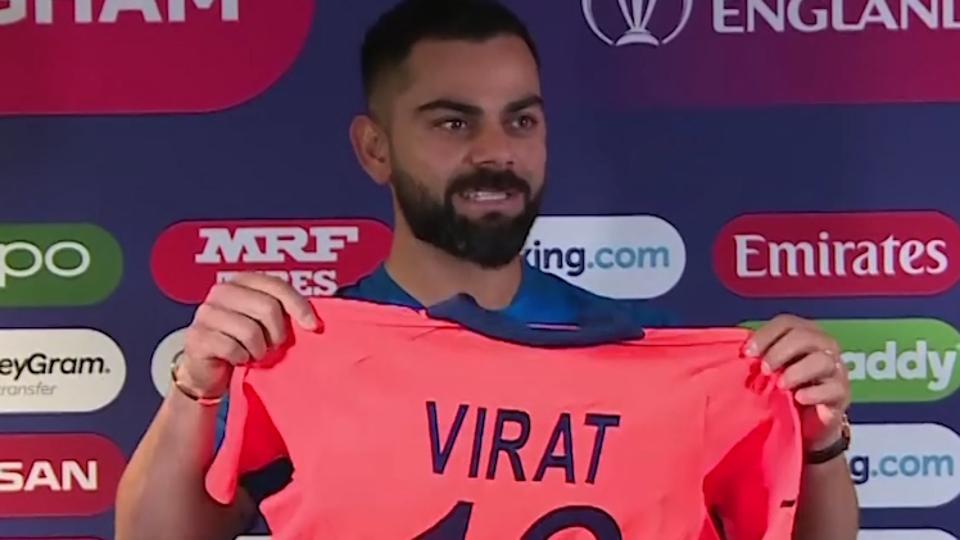 Virat Kohli Unveils Orange Jersey Calls Englands Performance Surprising Hindustan Times 0388