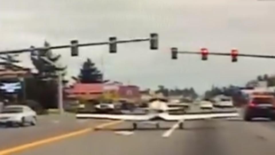 Plane lands on a busy road, freaky video captured on police dashcam ...