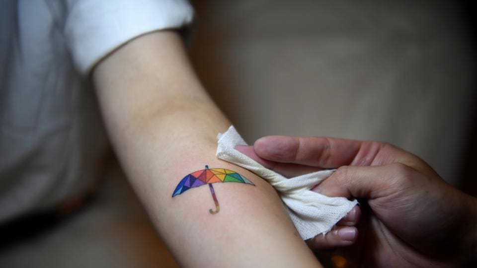 Hong Kong Stamp Tattoo by tattooist Ian Wong  Tattoogridnet