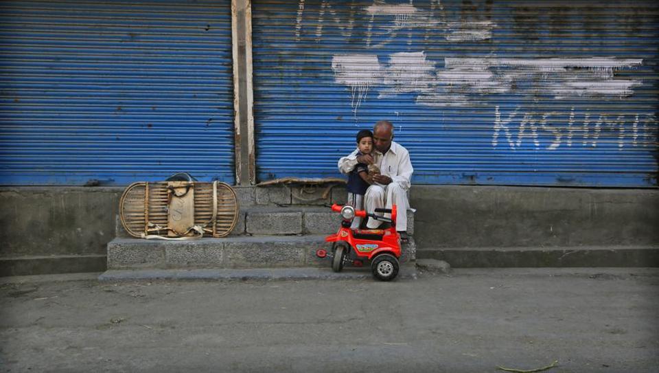 Photos: Lockdown in Kashmir cripples daily life of children