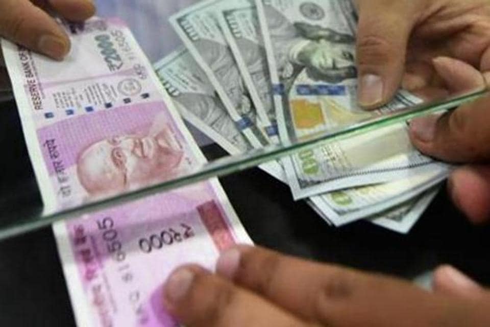 Rupee falls 14 paise to 77.69 against US dollar in early trade. (PTI)