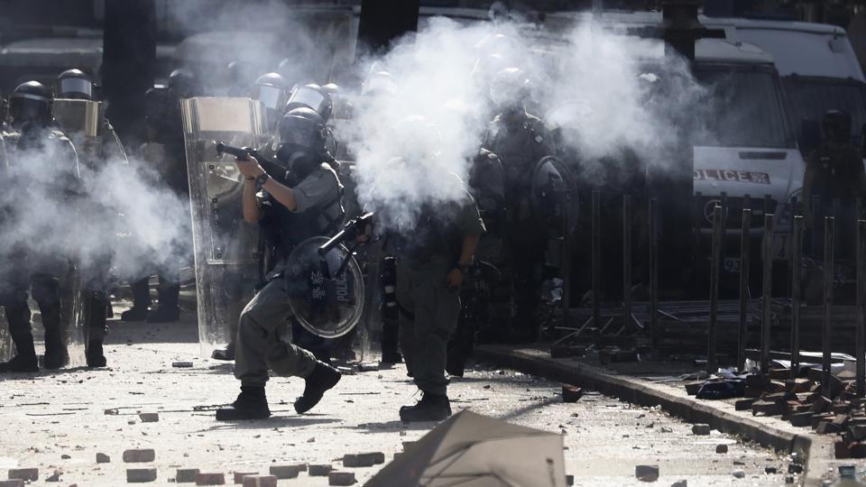 Hong Kong Officer Hit By Arrow Police Fire Water Cannons World News