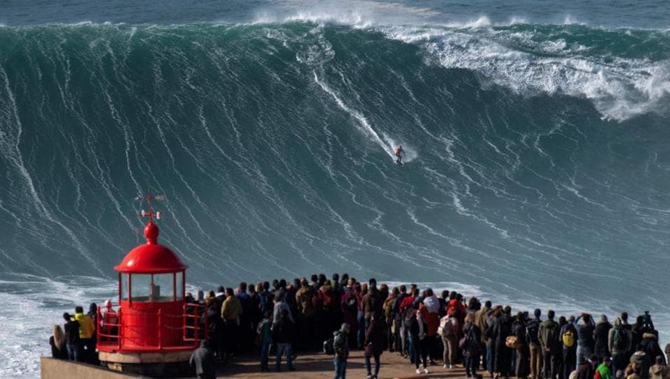 Photos Extreme surfers flock to Portugal’s Nazare to catch record