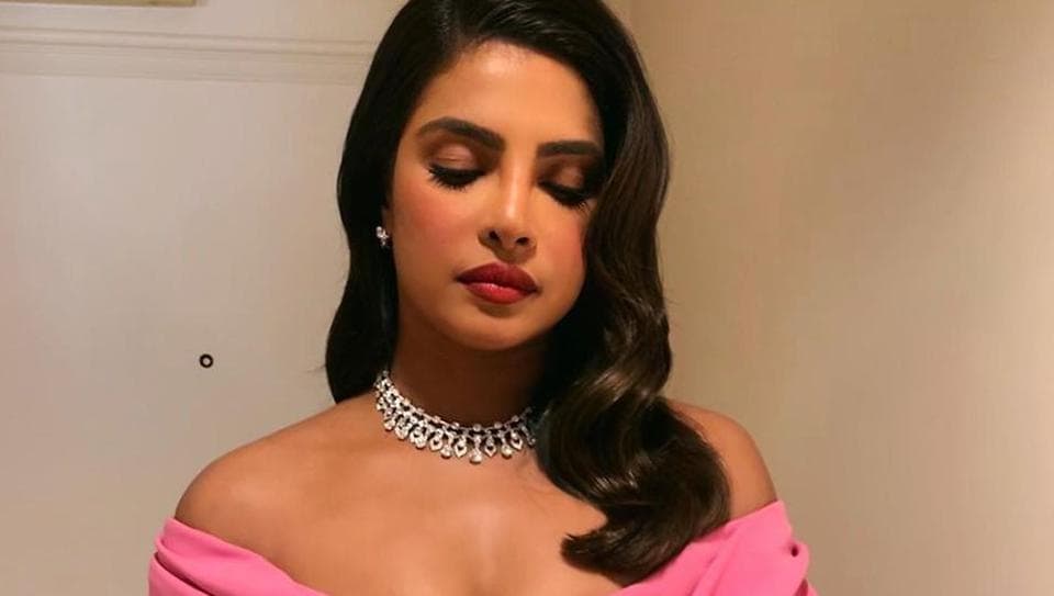 Golden Globes 2020: Priyanka Chopra stuns in pink gown, Bvlgari jewels,  Nick Jonas looks dapper in suit, remind us why they're the best-dressed  couple | Fashion Trends