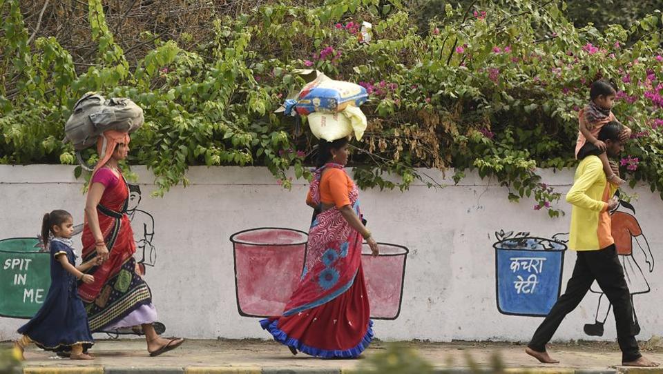 Photos: Lockdown on, and a long walk home for India’s migrant workers ...