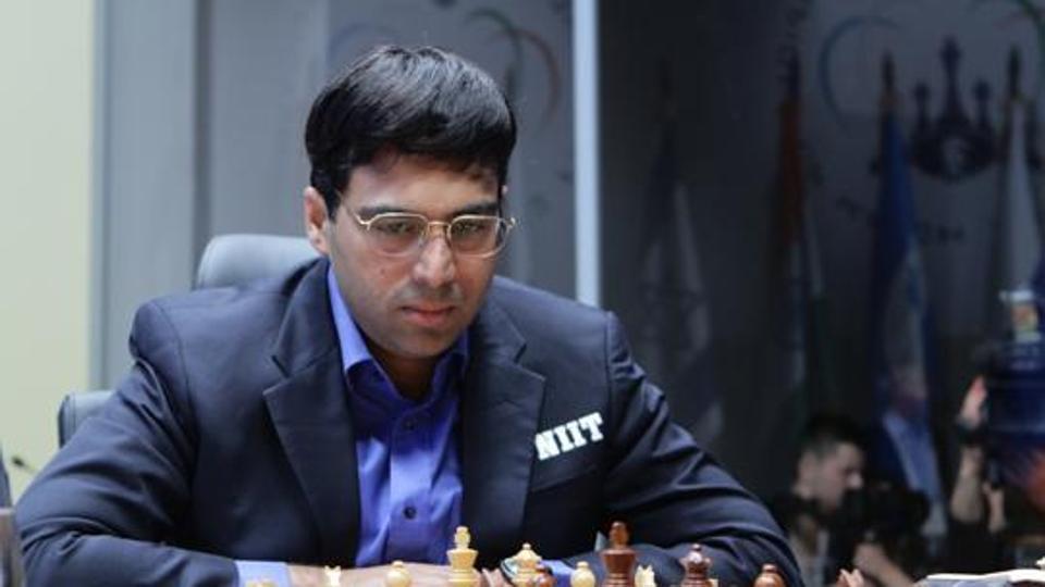 Yogi hands over Chess Olympiad torch to Viswanathan Anand