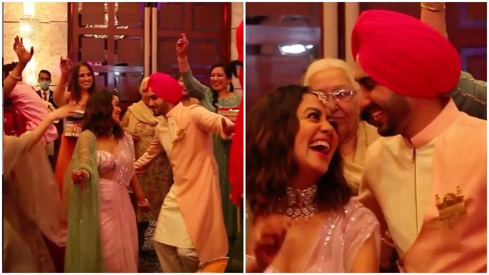 Neha Kakkar, Rohanpreet Singh dance to dhol beats, share hugs at their roka ceremony. Watch