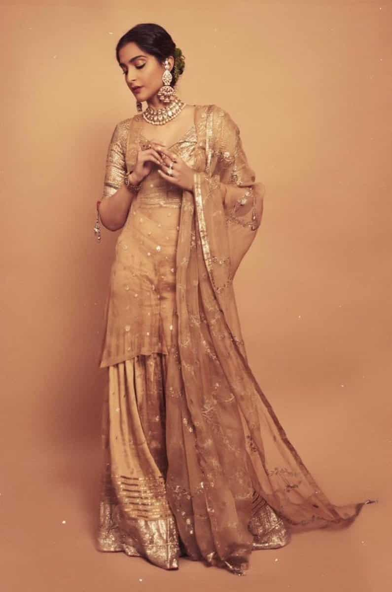 Sonam Kapoor looks ethereal in glittery nude and gold lehenga. See pics |  Fashion Trends - Hindustan Times