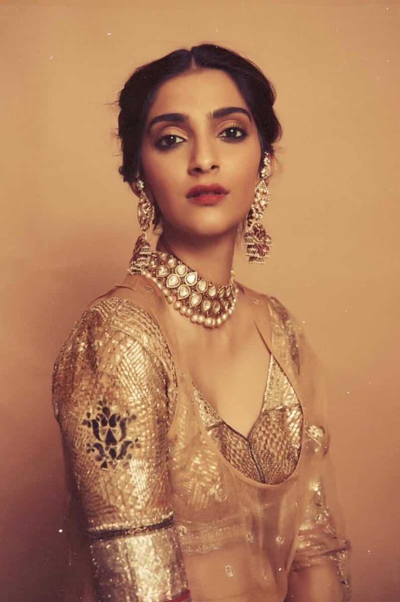 798px x 1200px - Sonam Kapoor looks ethereal in glittery nude and gold lehenga. See pics |  Fashion Trends - Hindustan Times