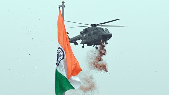 New Delhi, India - Aug. 15, 2023: Indian Air Force helicopter showers flower petals after Prime Minister Narendra Modi unfurled the Indian flag at Red Fort on the occation of 77th Independence Day, in New Delhi, India, on Tuesday, August 15, 2023.  (Photo by Sanjeev Verma/ Hindustan Times)