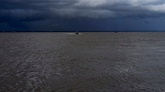 Cyclone Remal: Clouds hover over 'Muri Ganga' River. 