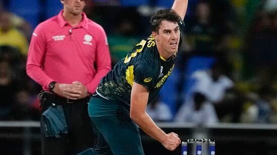 Australia's Pat Cummins bowls during the ICC Men's T20 World Cup cricket match between Australia and Bangladesh