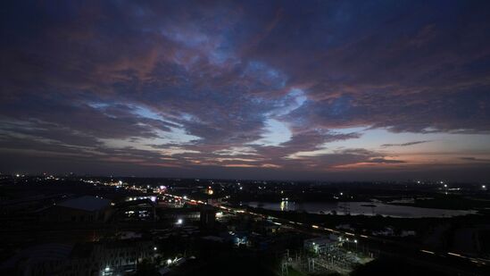 Dark clouds hover on the outskirts of Chennai, India, Thursday, July 11, 2024. India expects its monsoon rains from June to October. (AP Photo/Mahesh Kumar A.)