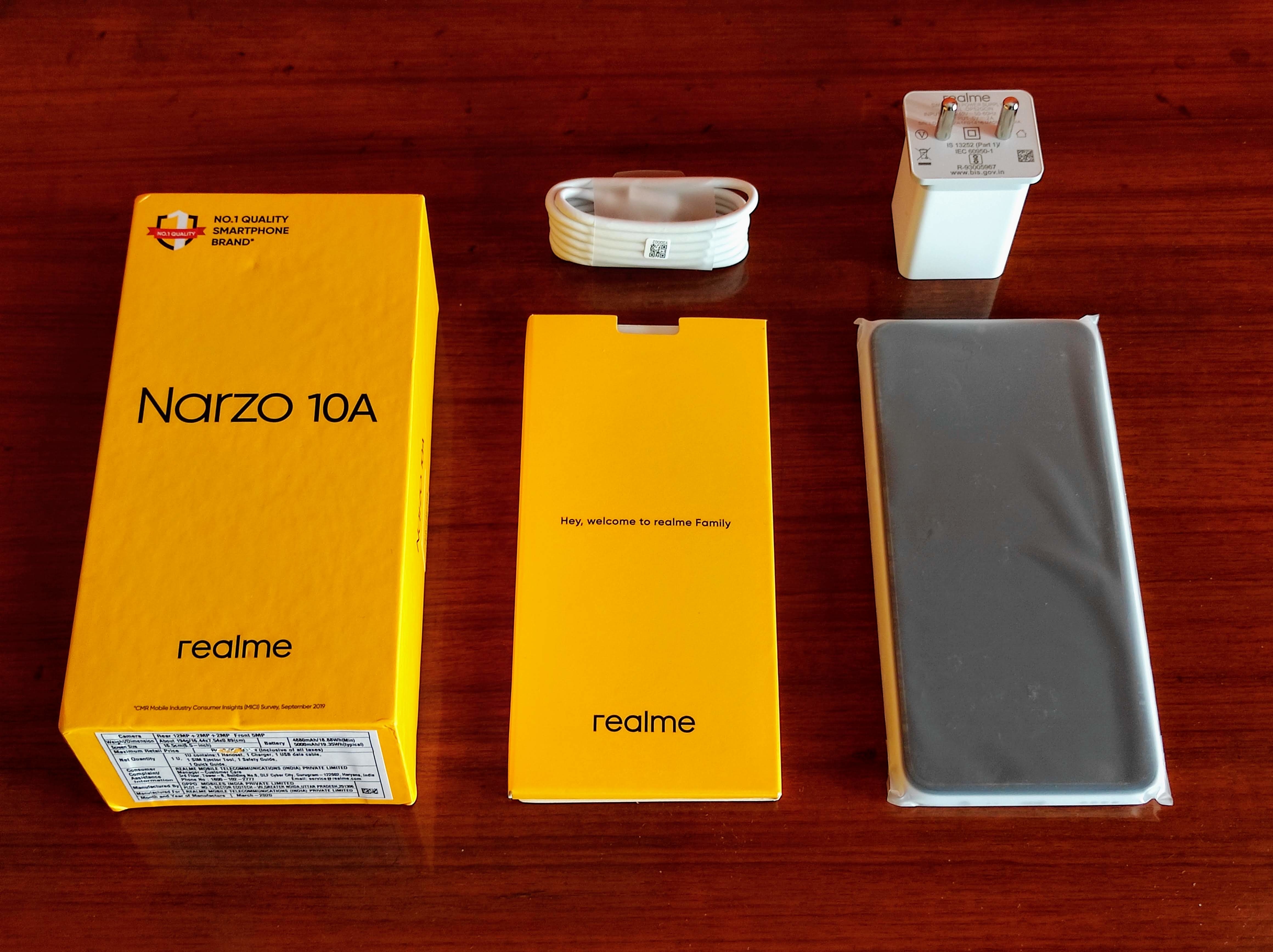 Inside the Narzo 10A box you get the documentation with SIM ejector tool along side a charging/data transfer cable, charger and the phone. Inside the Narzo 10A box you get the documentation with SIM ejector tool along side a charging/data transfer cable, charger and the phone.