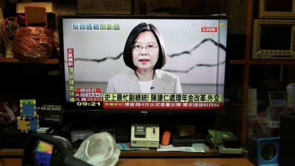 The live inauguration ceremony of Taiwan President Tsai Ing-wen is seen playing at a shop in Taipei, Taiwan, May 20,2020. 