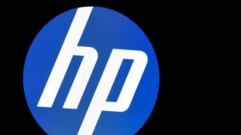FILE PHOTO: A screen displays the logo for HP Inc. at the New York Stock Exchange (NYSE) in New York, U.S., November 18, 2019. REUTERS/Brendan McDermid