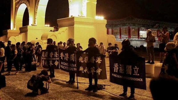 Hong Kong anti-government demonstrators gather at Liberty Square in Taipei to mark the 31st anniversary of the crackdown of pro-democracy protests at Beijing's Tiananmen Square in 1989, Taiwan, June 4, 2020. 