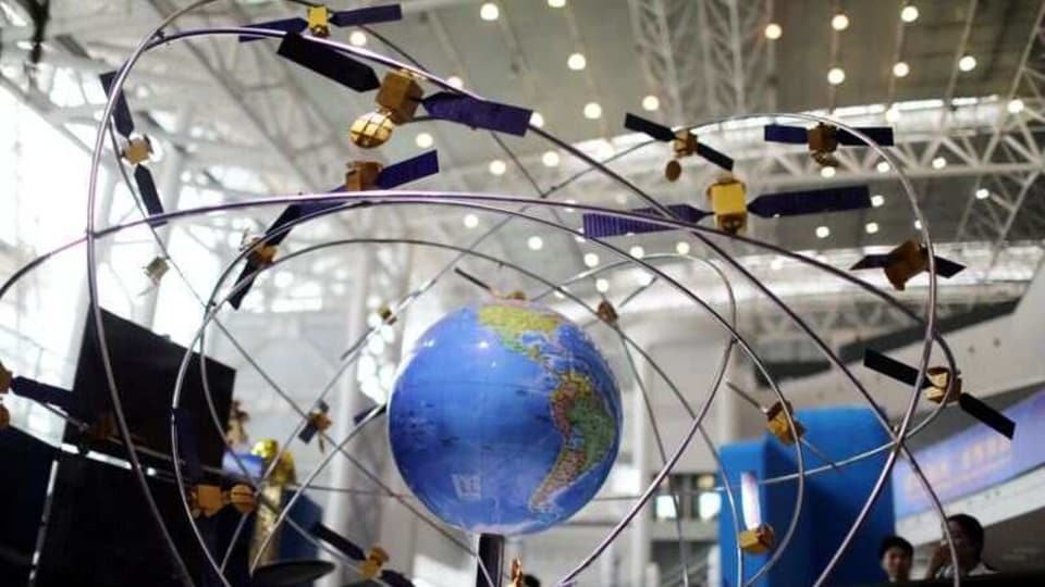 A model of the BeiDou navigation satellites system is seen at an exhibition to mark China's Space Day 2019 