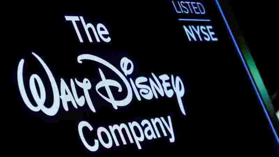 FILE PHOTO:  A screen shows the logo and a ticker symbol for The Walt Disney Company on the floor of the New York Stock Exchange (NYSE) in New York, U.S., December 14, 2017. REUTERS/Brendan McDermid/File photo
