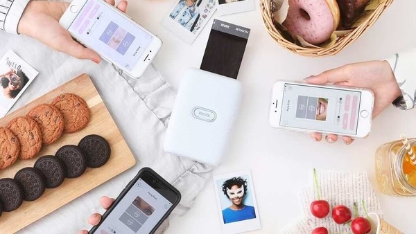 The Instax Mini Link connects with your smartphone over a Bluetooth connection via a dedicated app.