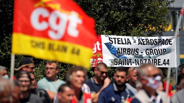 CGT union members gather during a demonstration in front of the Airbus facility in Montoir-de-Bretagne near Saint-Nazaire, France July 8, 2020.