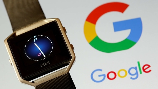 Fitbit Blaze watch is seen in front of a displayed Google logo in this illustration picture.