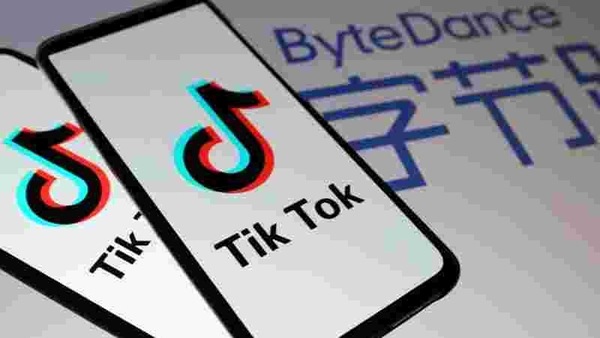 TikTok logos are seen on smartphones in front of a displayed ByteDance logo in this illustration taken November 27, 2019.