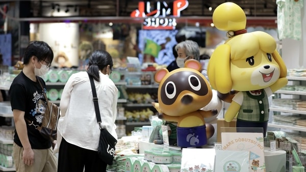 Figurines of the characters Isabelle, right, and Tom Nook from the Nintendo Co. video game Animal Crossing: New Horizons are displayed inside the Nintendo TOKYO store in Tokyo, Japan, on Tuesday, Aug. 4, 2020. Nintendo is scheduled to report first-quarter earnings figures on Aug. 6. Photographer: Kiyoshi Ota/Bloomberg