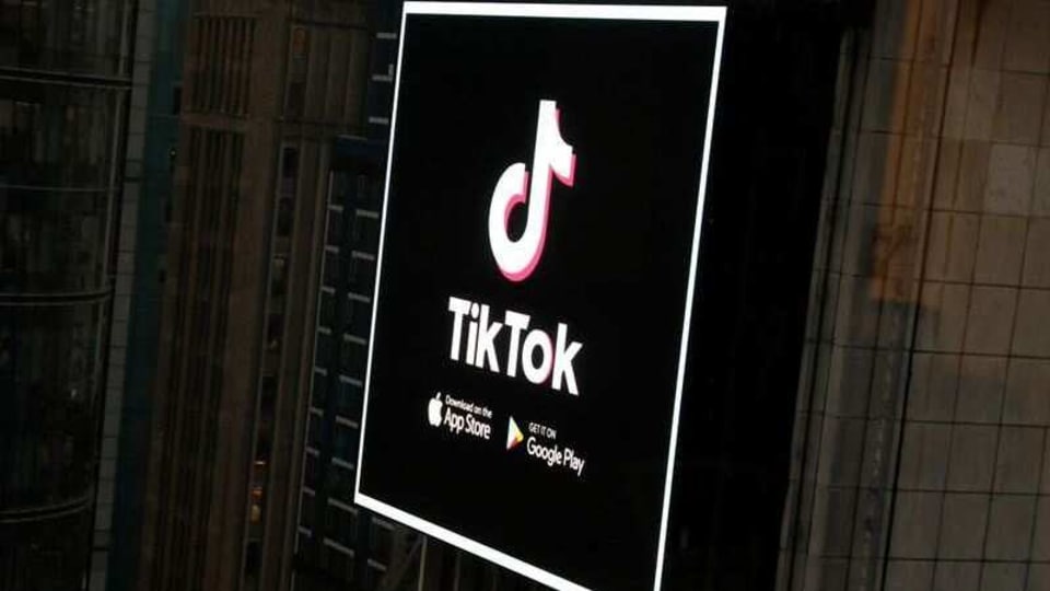 The TikTok logo is seen on a screen over Times Square in New York City, U.S., March 6, 2020.
