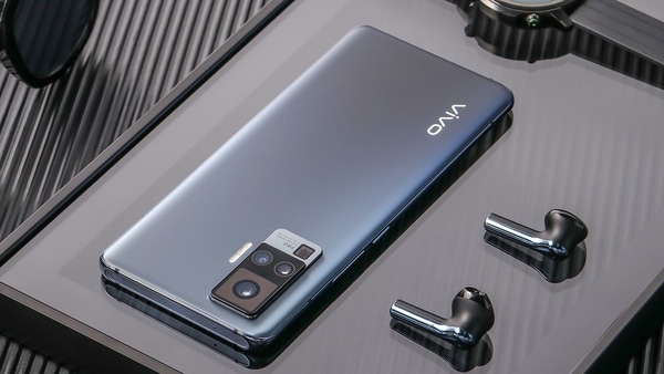 One of the videos on Weibo shows a smartphone that looks similar to the Vivo X50 (pictured above) that changes colour with the press of a button. 