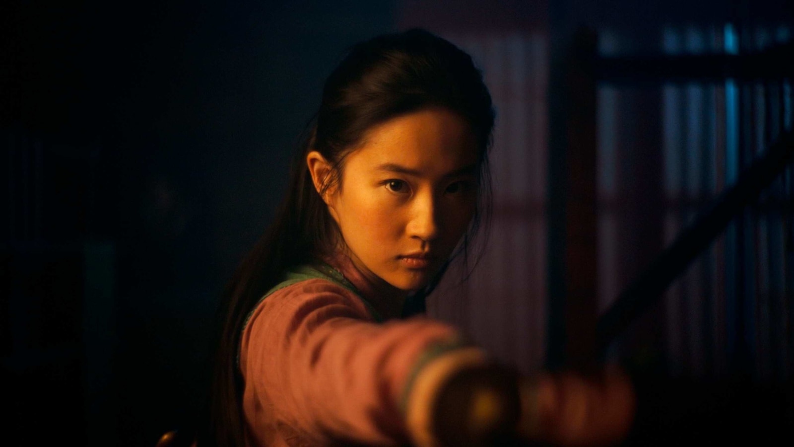 This image released by Disney shows Yifei Liu in the title role of This image released by Disney shows Yifei Liu in the title role of