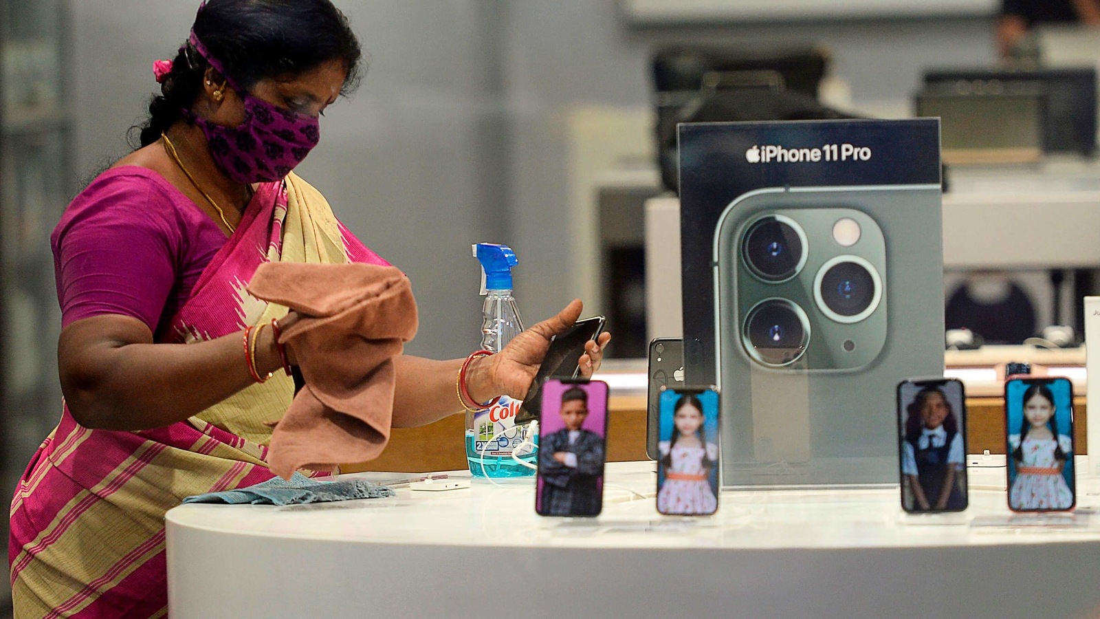 A worker sanitises an Apple store inside a shopping mall reopened after the government eased a nationwide lockdown imposed as a preventive measure against the Covid-19 coronavirus, in Chennai on September 1, 2020. A worker sanitises an Apple store inside a shopping mall reopened after the government eased a nationwide lockdown imposed as a preventive measure against the Covid-19 coronavirus, in Chennai on September 1, 2020.