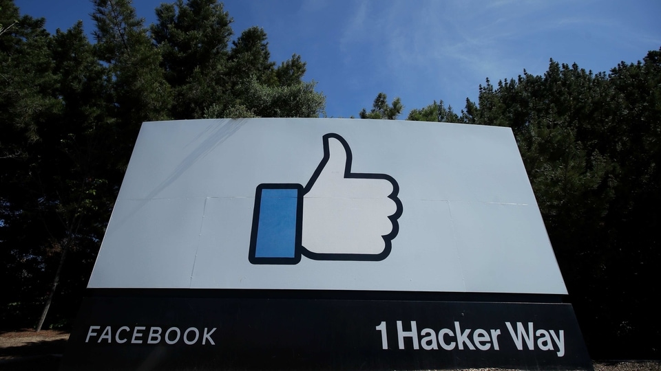 In this April 14, 2020 file photo, the thumbs up Like logo is shown on a sign at Facebook headquarters in Menlo Park, Calif.