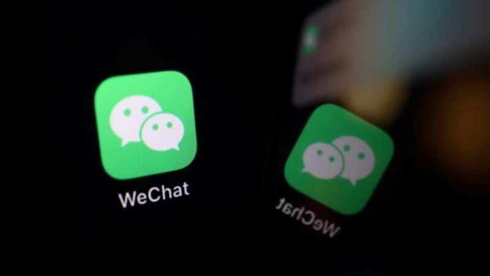 The sign of the WeChat app is seen reflected on a mobile phone in this illustration picture taken September 19, 2020.