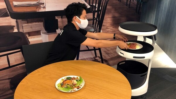 SoftBank's robotics arm demonstrates a food service robot Servi, developed by California-based Bear Robotics to Japan as restaurants grapple with labour shortages and seek to ensure social distancing during the coronavirus disease (COVID-19) outbreak, in Tokyo, Japan, September 28, 2020.