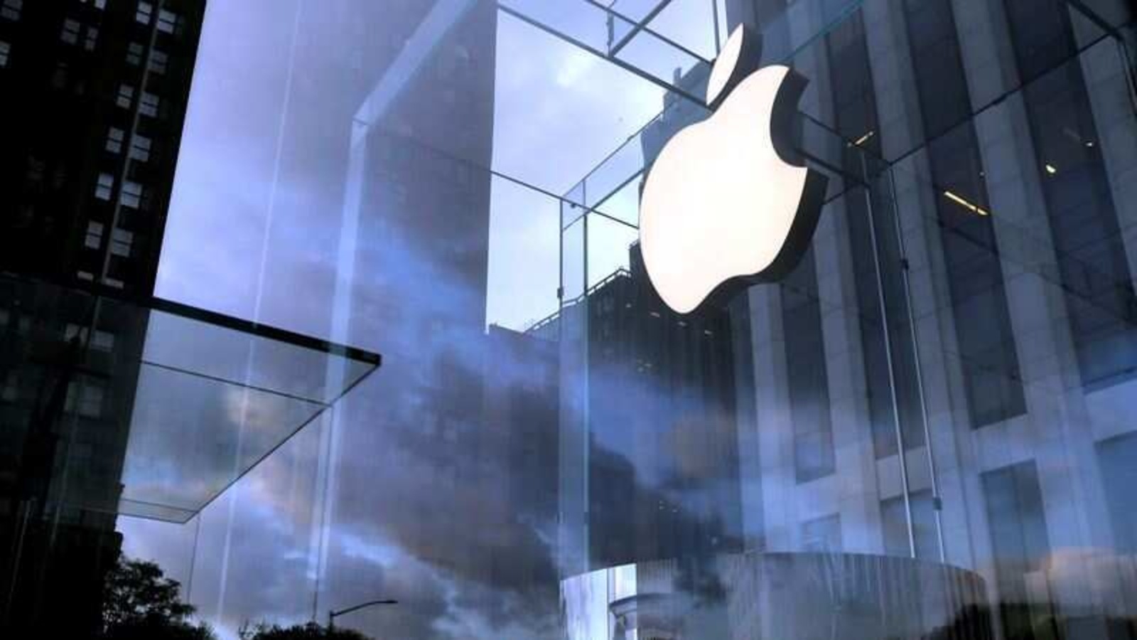 The Apple Inc. logo is seen hanging at the entrance to the Apple store on 5th Avenue in Manhattan, New York, U.S., October 16, 2019. REUTERS/Mike Segar/File Photo