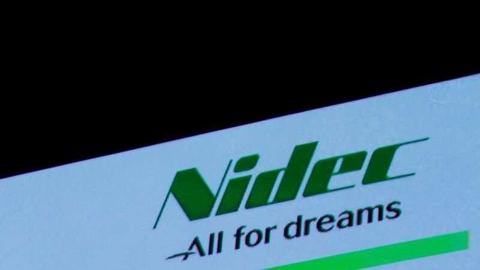FILE PHOTO: Nidec Corp's logo is pictured at an earnings results news conference in Tokyo, Japan, July 25, 2018. REUTERS/Kim Kyung-Hoon/File Photo