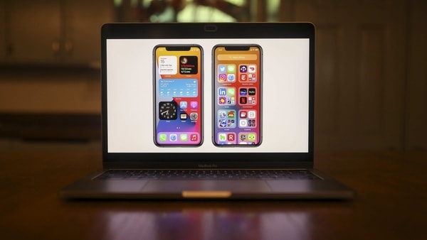 Apple iPhones displaying the new look of the iOS 14 operating system. 