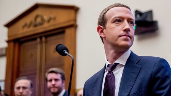 In this Wednesday, Oct. 23, 2019, file photo, Facebook CEO Mark Zuckerberg arrives for a House Financial Services Committee hearing on Capitol Hill in Washington, on Facebook's impact on the financial services and housing sectors. 